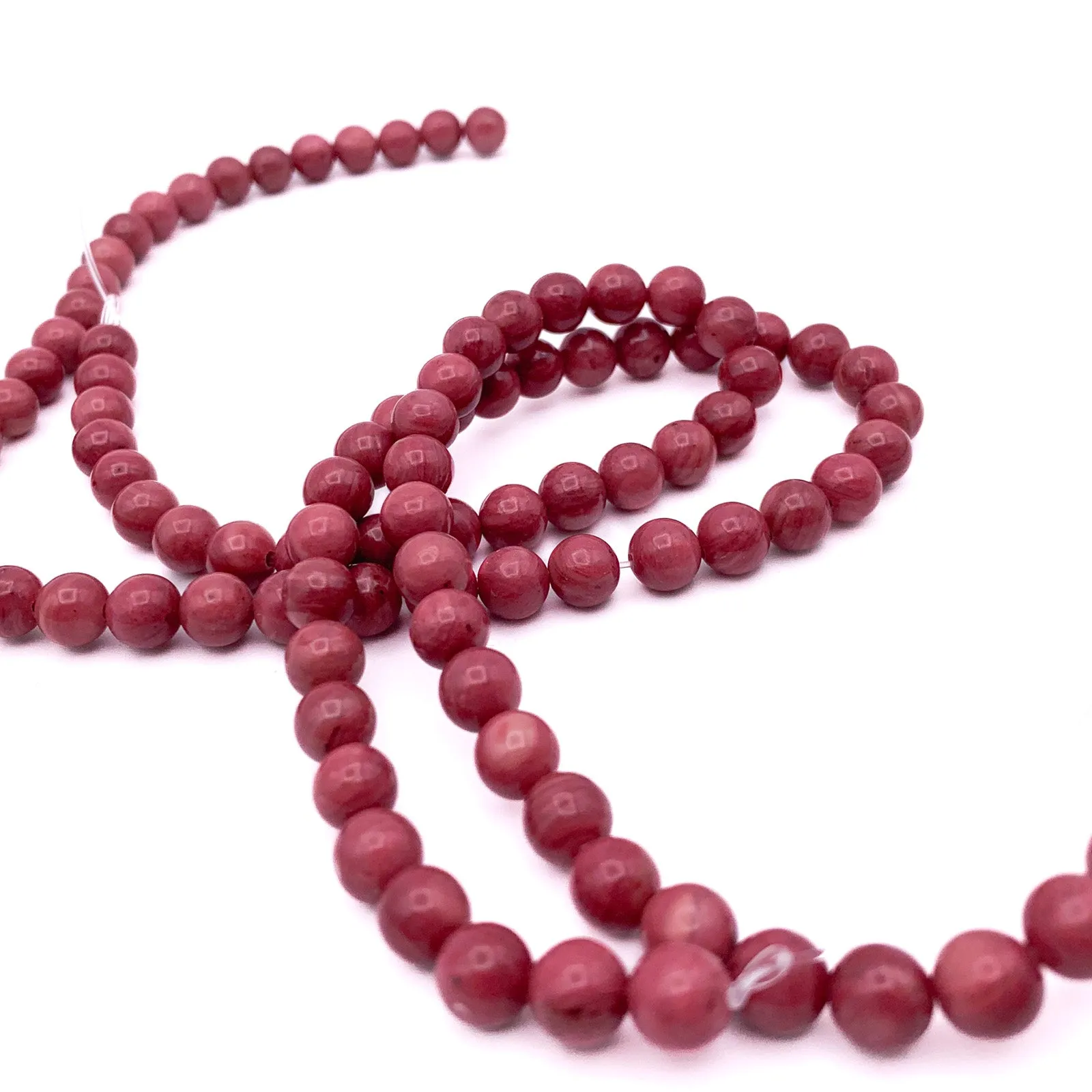 Rhodonite 6.4mm AAA Smooth Rounds Bead Strand